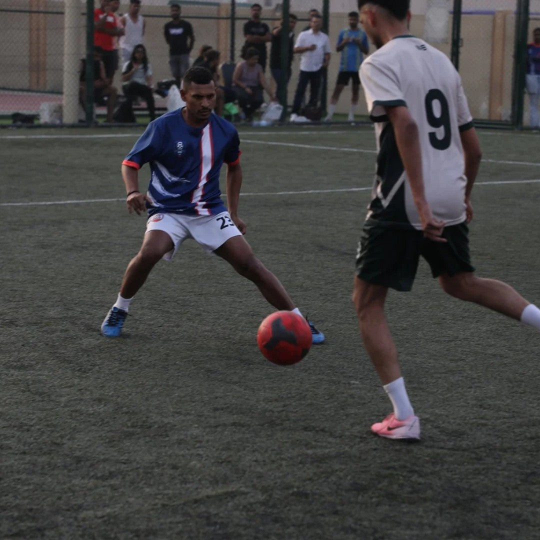 7-a-side game on the floodlit pitch at Sports Bay, Al Karama