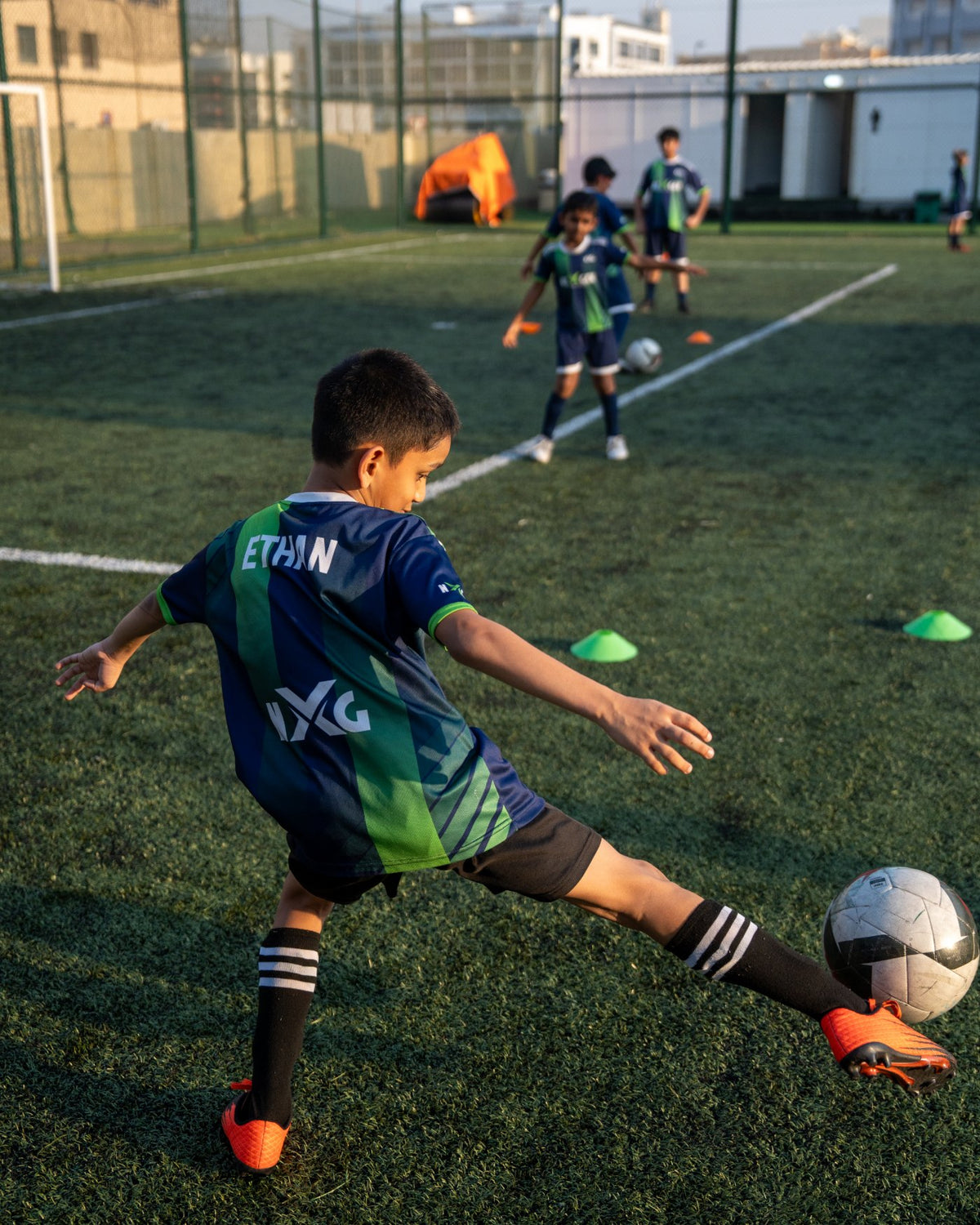 NEXGEN player striking the ball