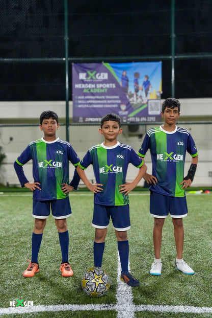Three NEXGEN players in academy kit